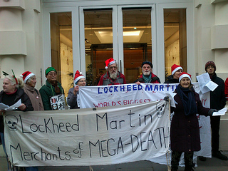 Trident Ploughshares carol singers wish Lockheed Martin a Merry Christmas